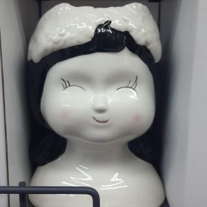 Testa porta pianta in ceramica